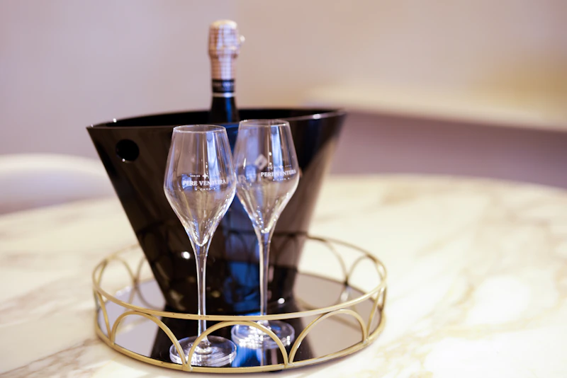 A couple of wine glasses sitting on top of a table