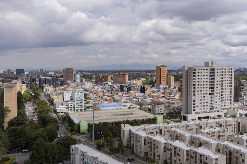 Cityscape with buildings under a cloudy sky