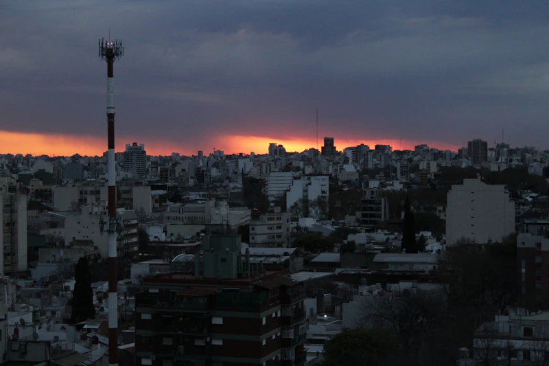 city with high rise buildings during sunset
